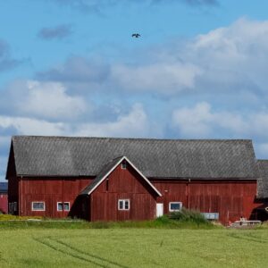 A rustic red farmhouse